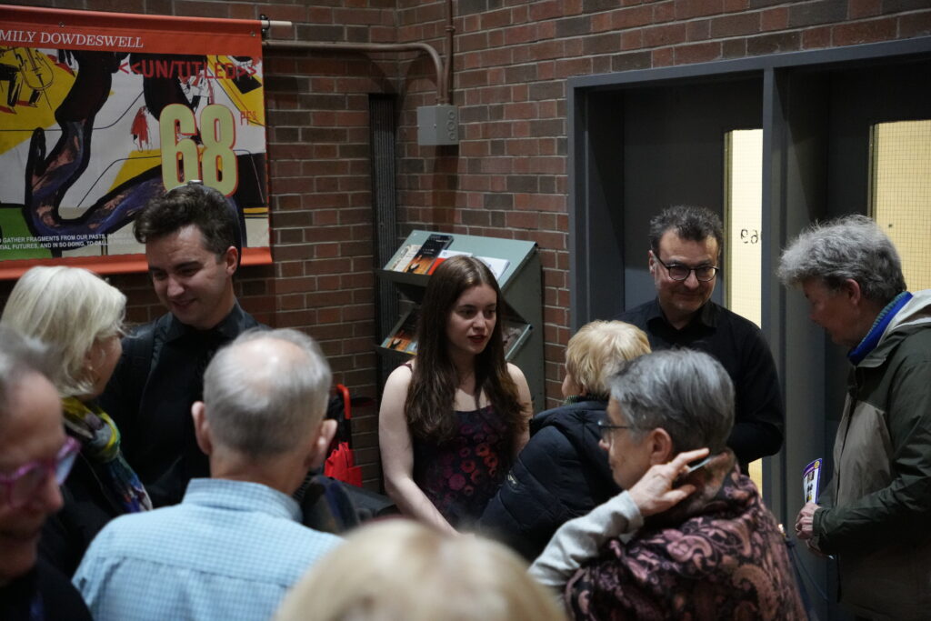 Performers chat with audience in Walter Hall Lobby